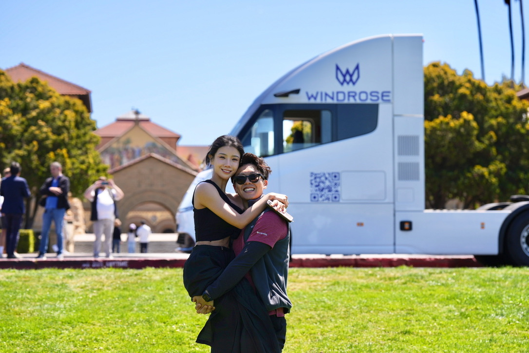 Wen Han, Founder & CEO of Windrose Electric, at Stanford University with the E700 truck